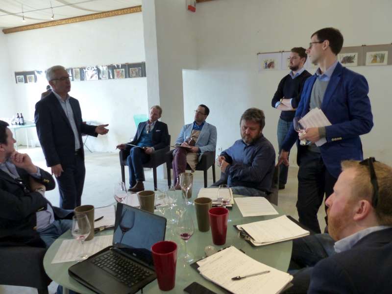 Denis Durantou discussing the finer points of the vintage with the team at Château L'Eglise Clinet.