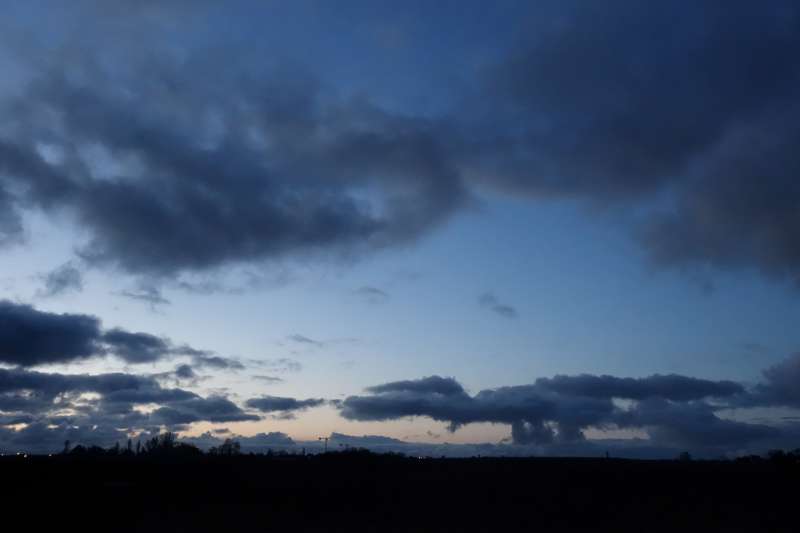 The sky over the vineyards of Chateau Latour (with cranes in the distance building the new winery at Chateau Lynch Bages)