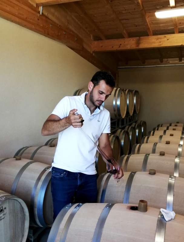 Drawing samples from Radoux barrels at Chateau Alverne